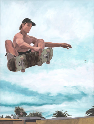 A handsome muscular guy flying through the air on a skateboard at a skatepark